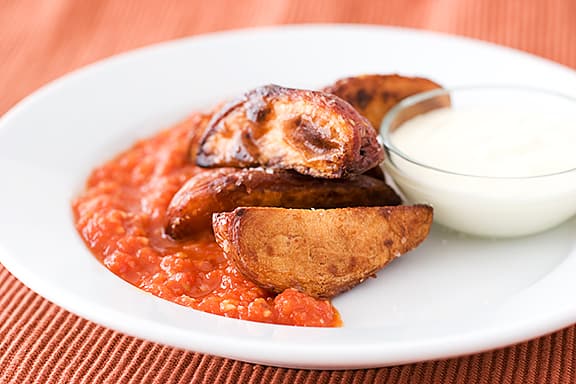 Crisp Potatoes with Spicy Tomato Sauce | www.tasteandtellblog.com