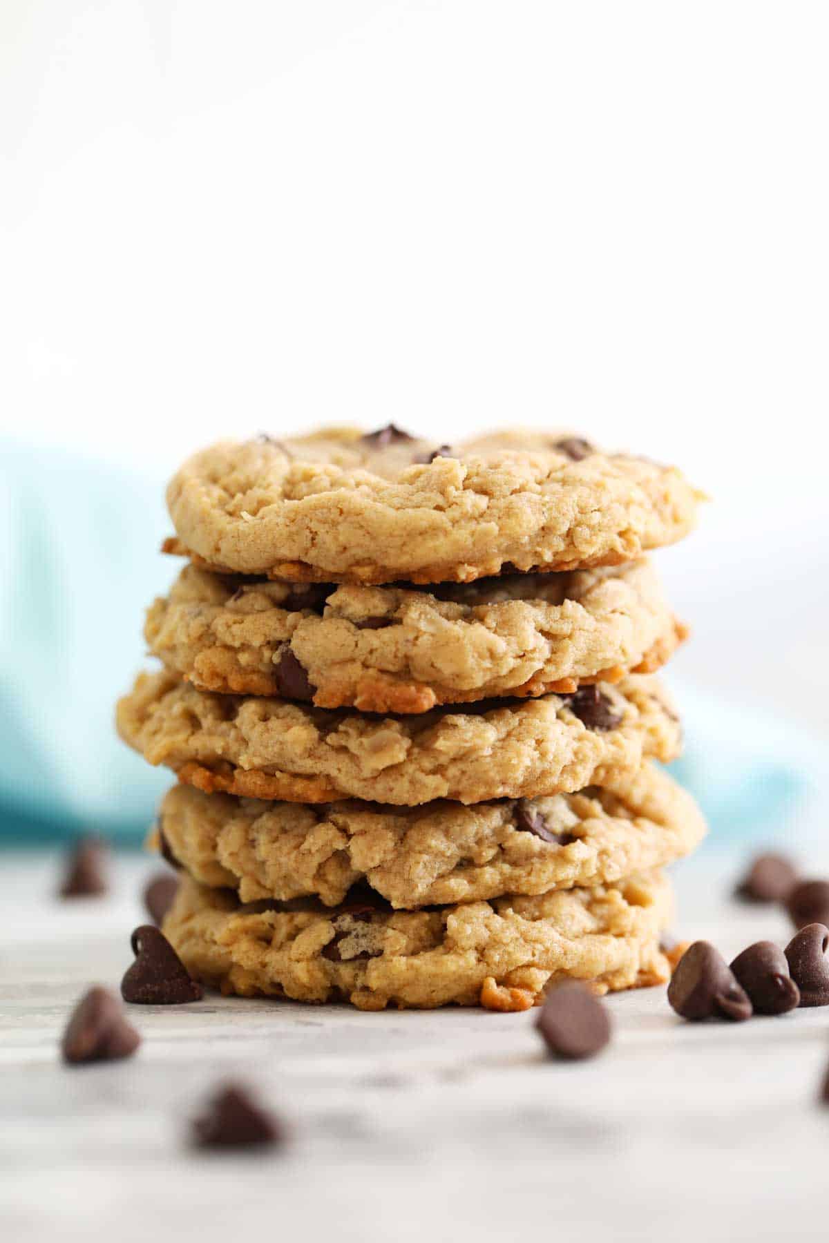 Peanut Butter Oatmeal Chocolate Chip Cookies with Chocolate Chips stacked on top of each other.