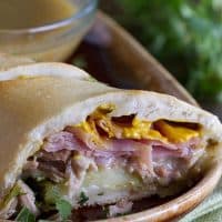 These Shortcut Cuban Sandwiches with Green Chile au Jus are a great way to get a dinner that is packed with flavor onto the table with very little effort!