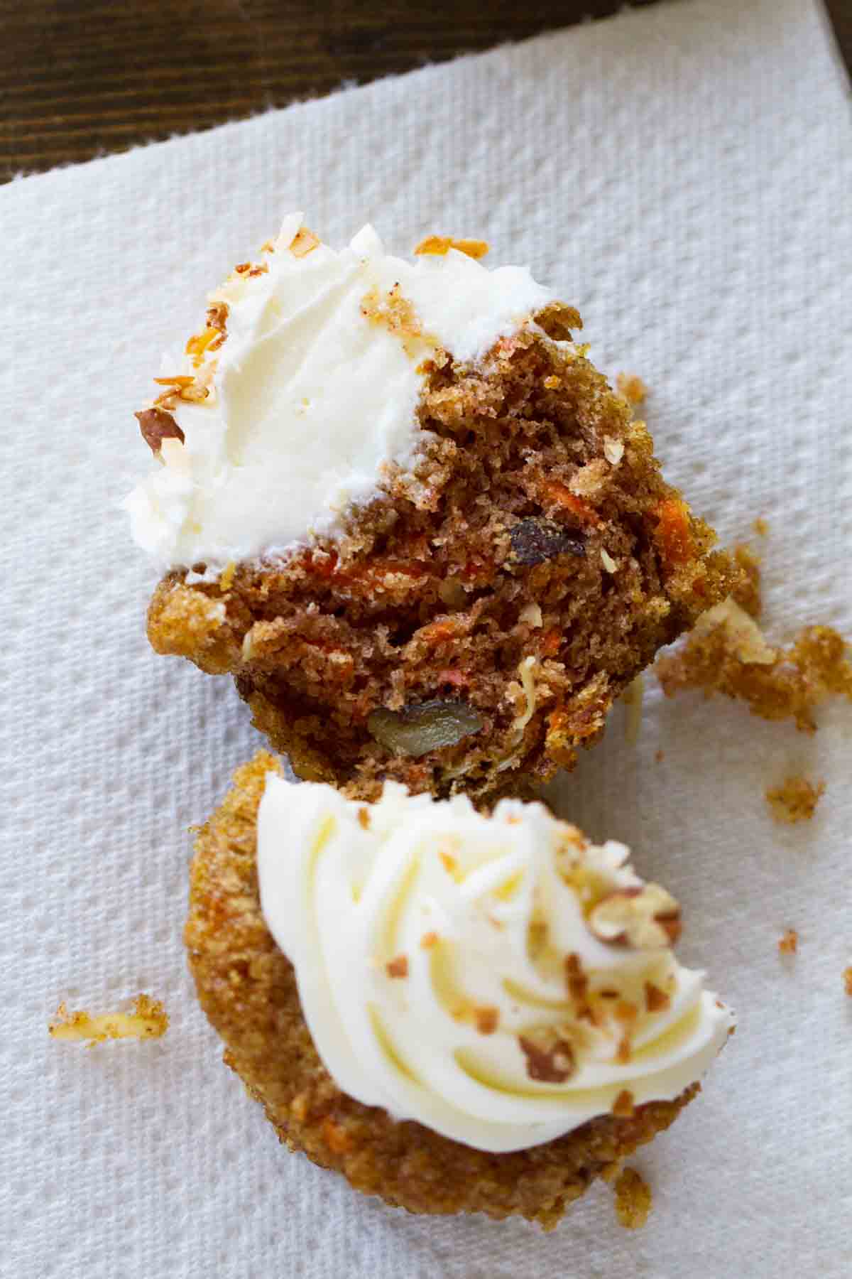 carrot cake cupcake cut in half to show interior