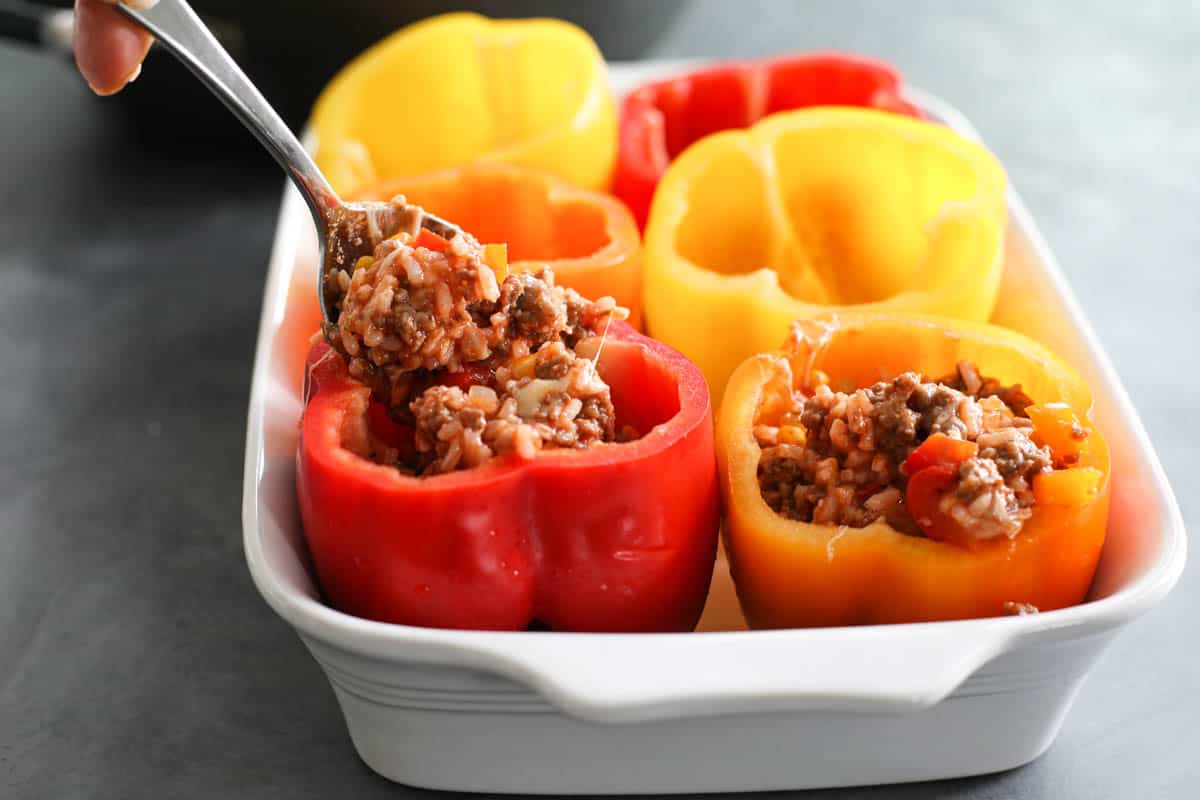 filling bell peppers with meat mixture