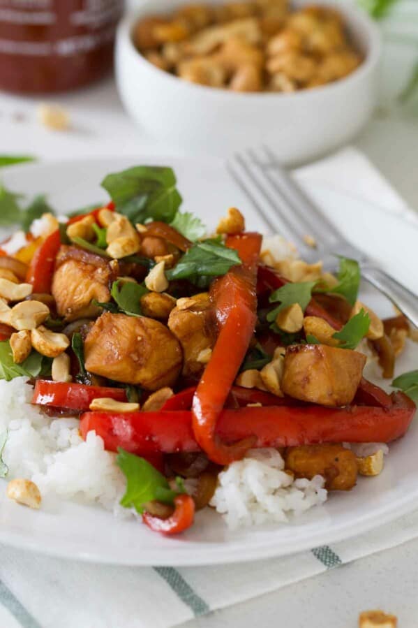 This Spicy Thai Chicken is a go-to every summer - a Thai inspired dish with chicken, bell peppers and lots of basil.