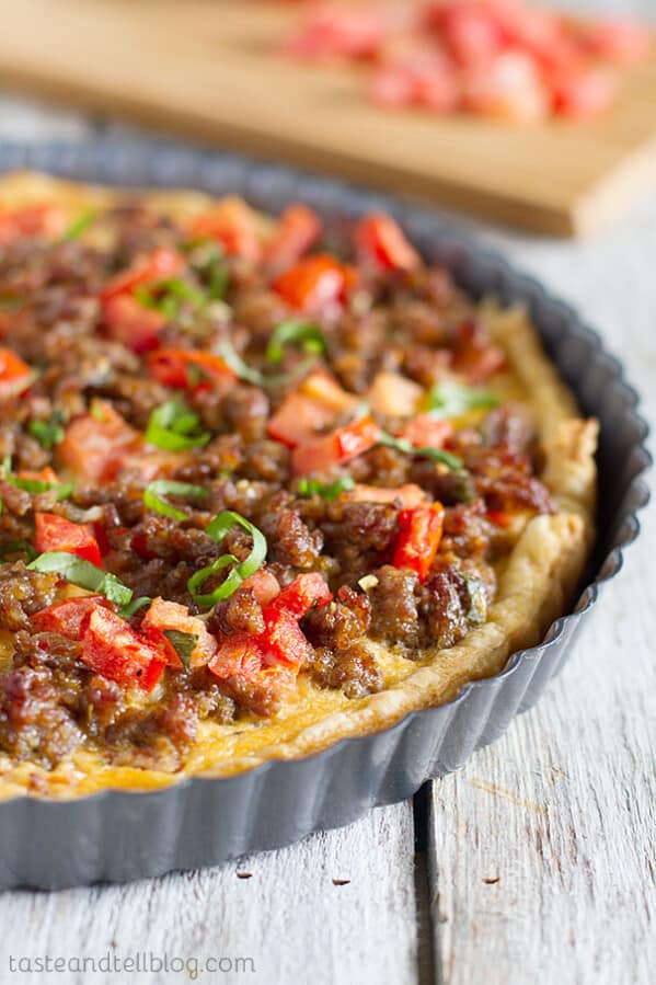 Savory Italian Tart - This quiche-like Italian Tart is filled with Italian sausage, tomatoes, eggs and cheese, all on top of a puff pastry crust. Perfect for breakfast, lunch or dinner!