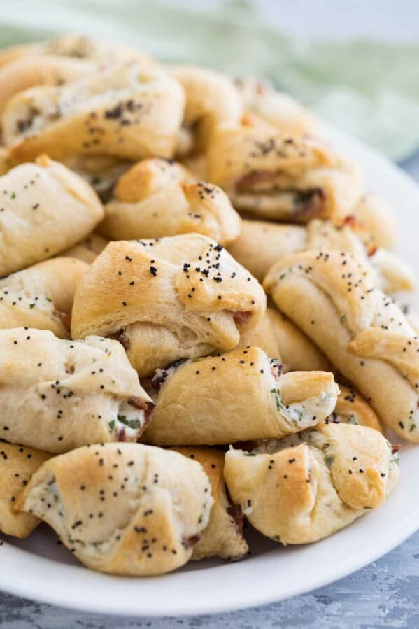 Plate filled with Bacon and Cream Cheese Crescent Appetizers.