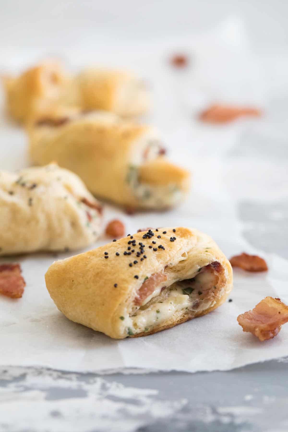 Bacon and Cream Cheese Crescent Appetizer cut open showing filling.