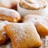 Not your typical scones served with tea, this German Scones Recipe is deep fried dough that is served with Cinnamon Honey Butter.