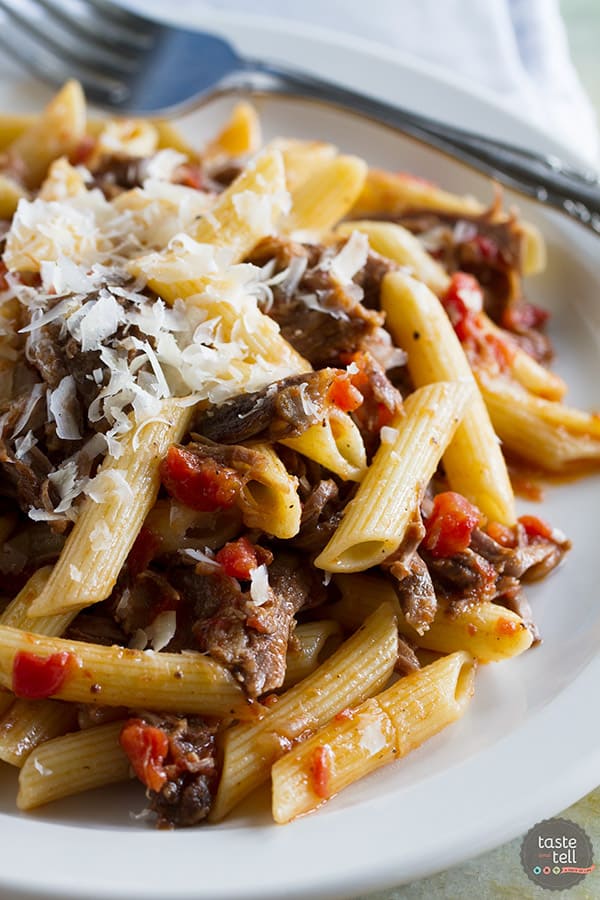 Beef short ribs are simmered in an easy tomato sauce for this Slow Simmered Short Rib Sauce with Pasta. It’s perfect for a Sunday supper!