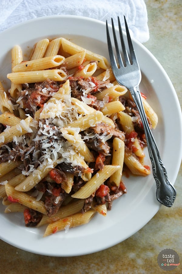 Beef short ribs are simmered in an easy tomato sauce for this Slow Simmered Short Rib Sauce with Pasta. It’s perfect for a Sunday supper!