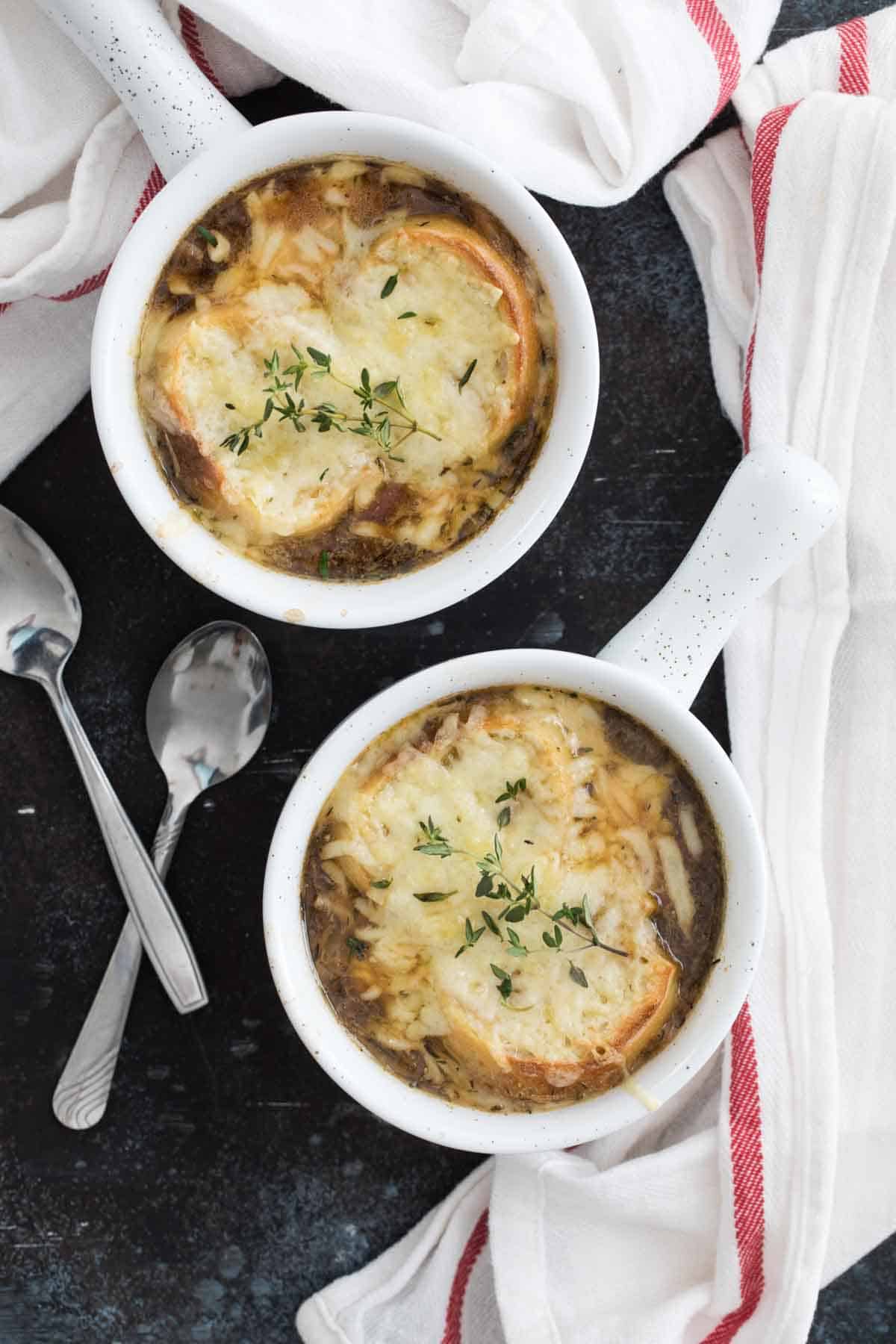 Overhead view of French onion soup in bowls