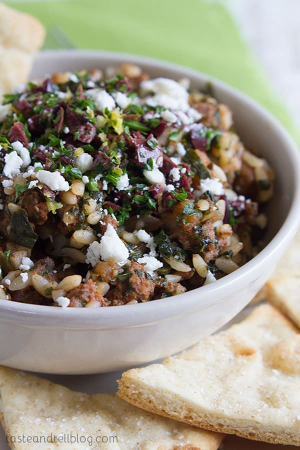 This Greek Goulash is a fun take on traditional goulash - with a hearty, beefy tomato sauce, orzo, and a refreshing Greek gremolata. Serve it up with some baked pita chips for a filling dinner.