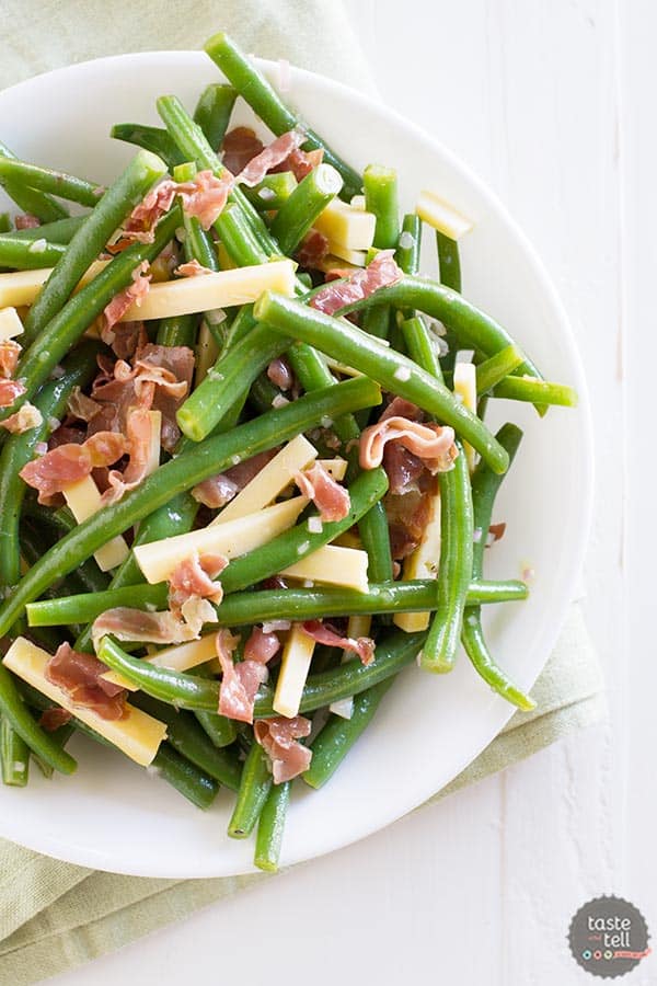 Jazz up your side dish with this Green Bean Recipe with Frizzled Prosciutto and Gouda. It is quick and delicious and a little different from the norm.
