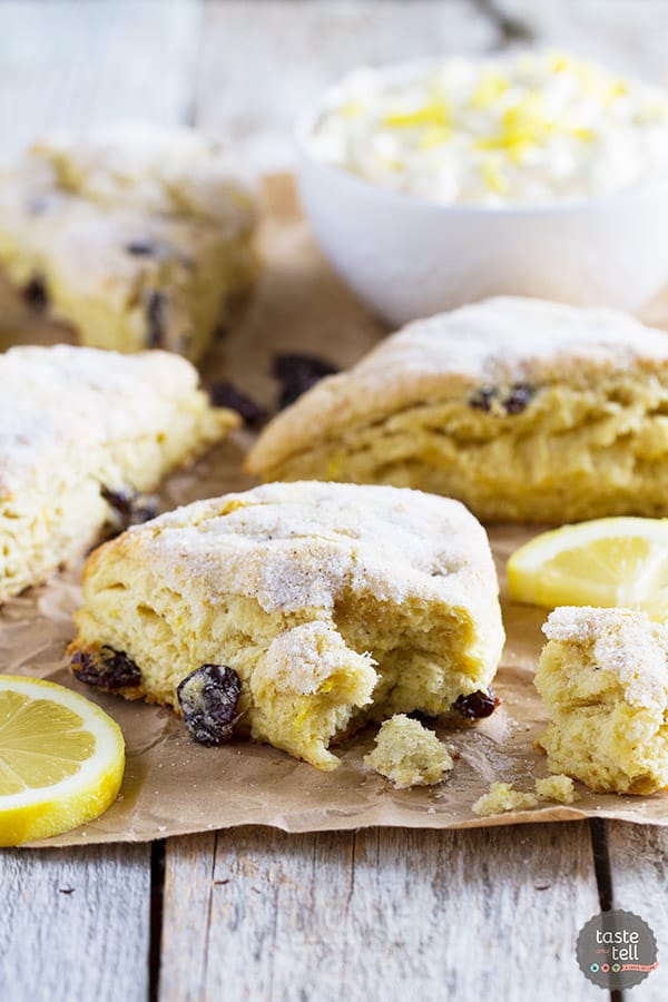 Tender and flaky, these Lemon Scones with Nutmeg and Cherries are not too sweet and perfect for breakfast or brunch. Served with a creamy spread, these scones are irresistible!