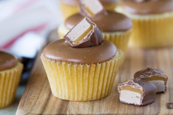 A frosting made from candy bars! These simple yellow cupcakes are topped with a sweet and smooth Milky Way Bar frosting. Candy bar lovers will love these Milky Way Bar Cupcakes!