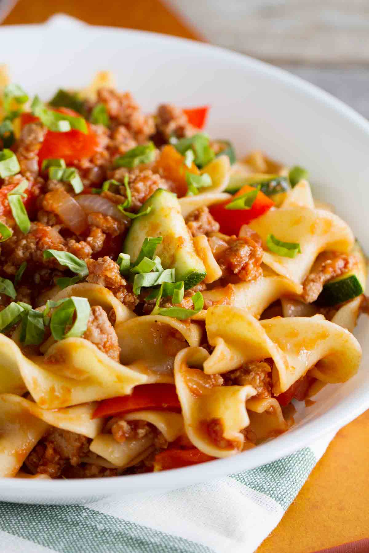 close up of bowl of turkey goulash with vegetables