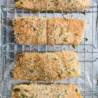 Pieces of Panko Crusted Salmon on a cooling rack.