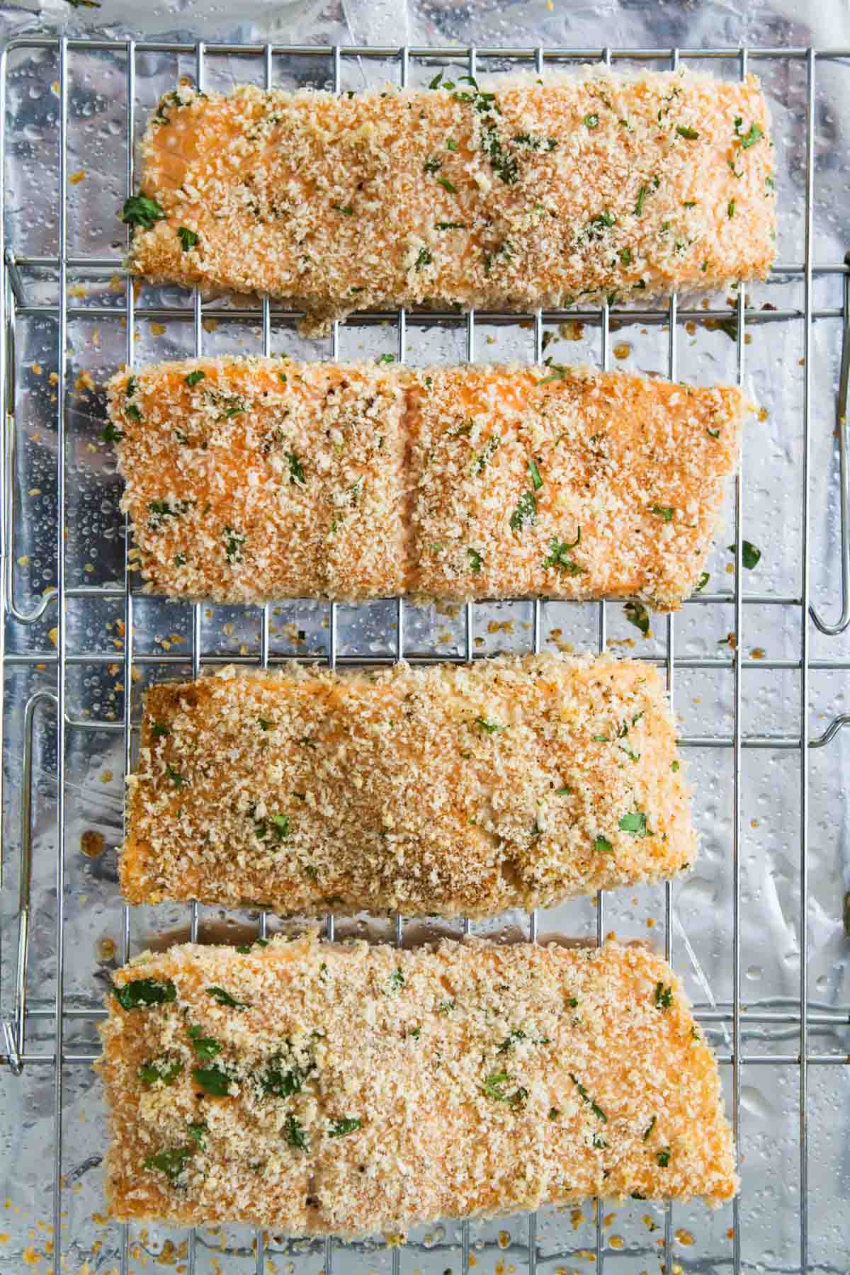 Pieces of Panko Crusted Salmon on a cooling rack.