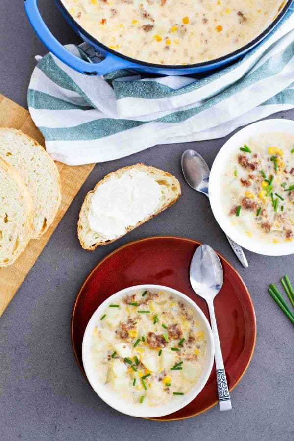 Corn and Sausage Chowder from above in bowl and pot