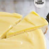 Creamy and rich, this Lemon Cheesecake has a cookie crust and is topped with a tart lemon curd.