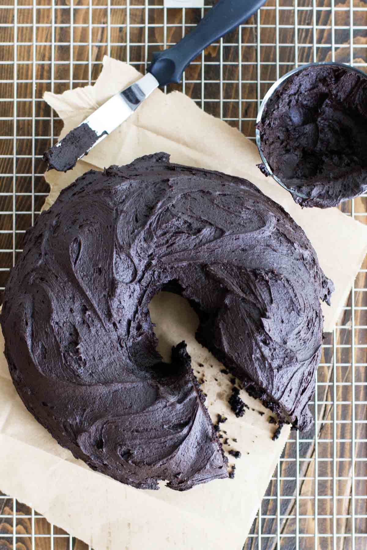 Root Beer Bundt Cake from scratch with a slice taken from it.