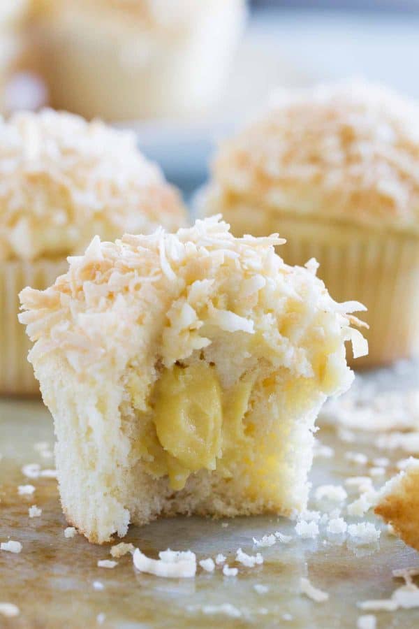 True coconut lovers will appreciate these Coconut Snowball Cupcakes! Coconut cupcakes are filled with a coconut pastry cream and then frosted with a coconut buttercream. Top them off with toasted coconut for the ultimate coconut treat!