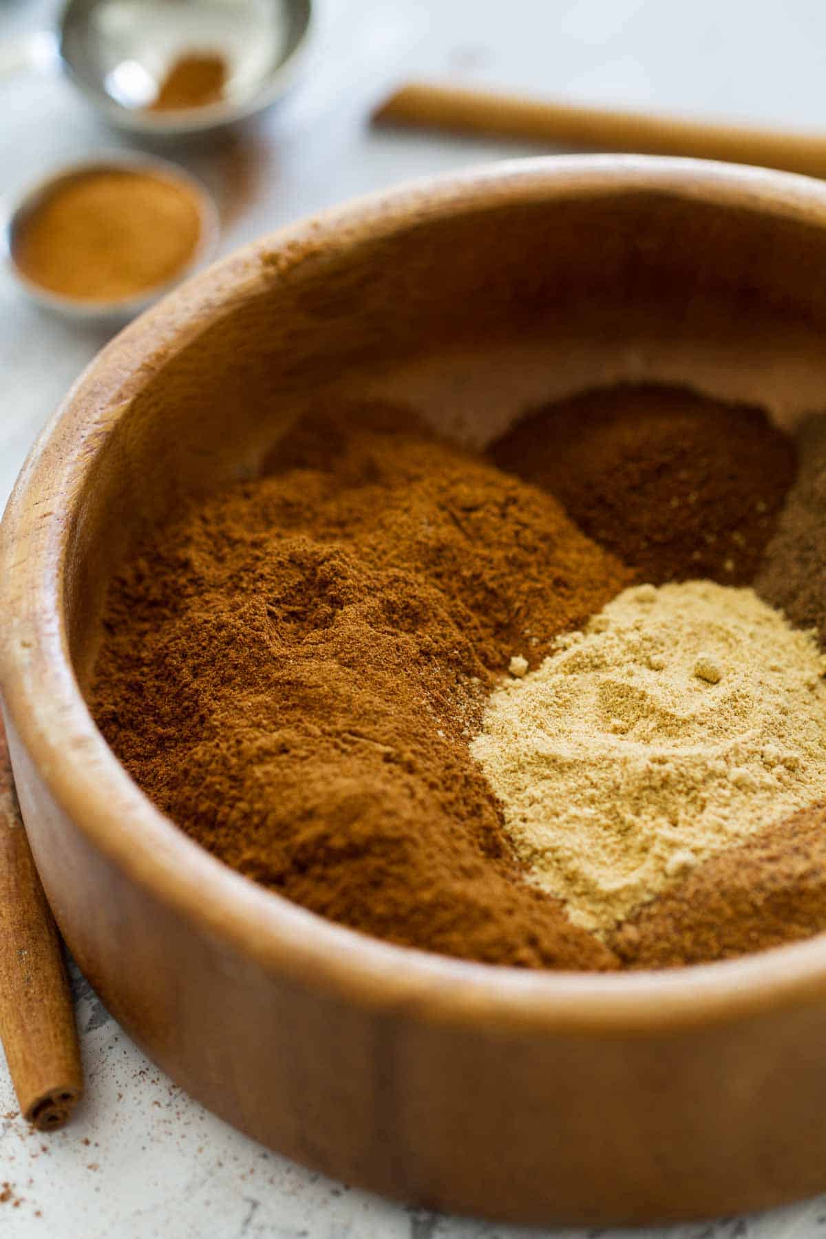 spices for pumpkin pie spice in a bowl
