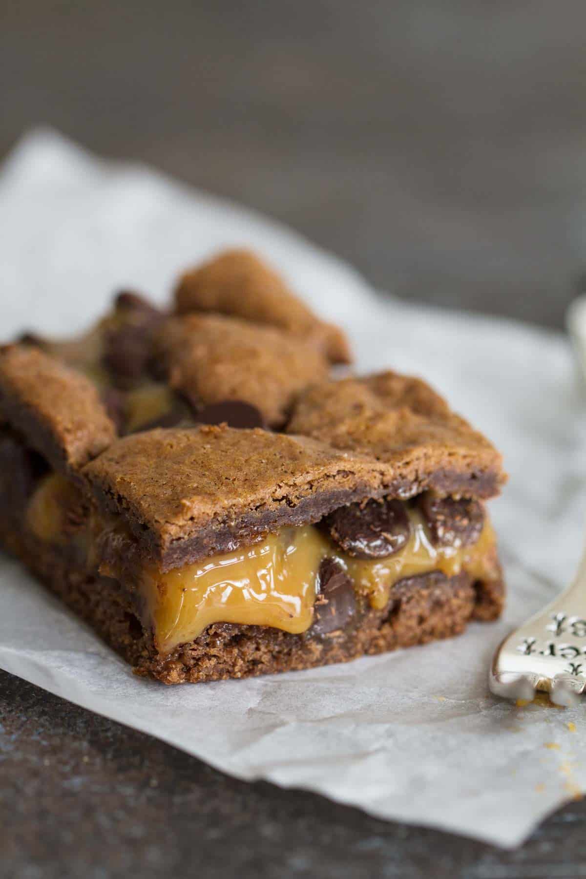 Caramel brownie with caramel oozing out.
