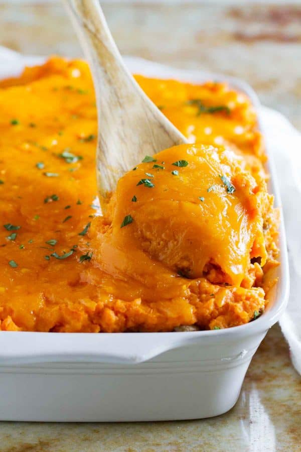 Ground turkey is combined with vegetables and an easy gravy, then topped with cheesy mashed sweet potatoes in this Turkey Sweet Potato Shepherd’s Pie. A great change up from the original!