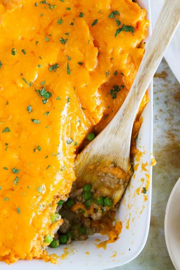 Ground turkey is combined with vegetables and an easy gravy, then topped with cheesy mashed sweet potatoes in this Turkey Sweet Potato Shepherd’s Pie. A great change up from the original!