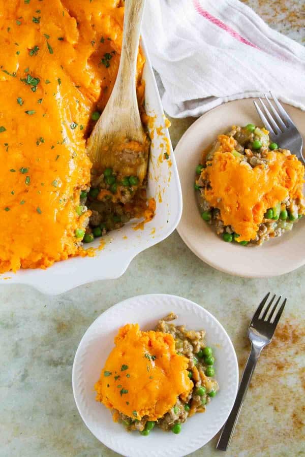 Ground turkey is combined with vegetables and an easy gravy, then topped with cheesy mashed sweet potatoes in this Turkey Sweet Potato Shepherd’s Pie. A great change up from the original!