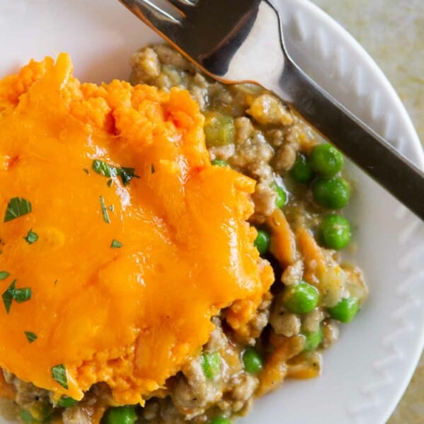 Plate with a serving of Turkey Shepherd's Pie with Sweet Potatoes.