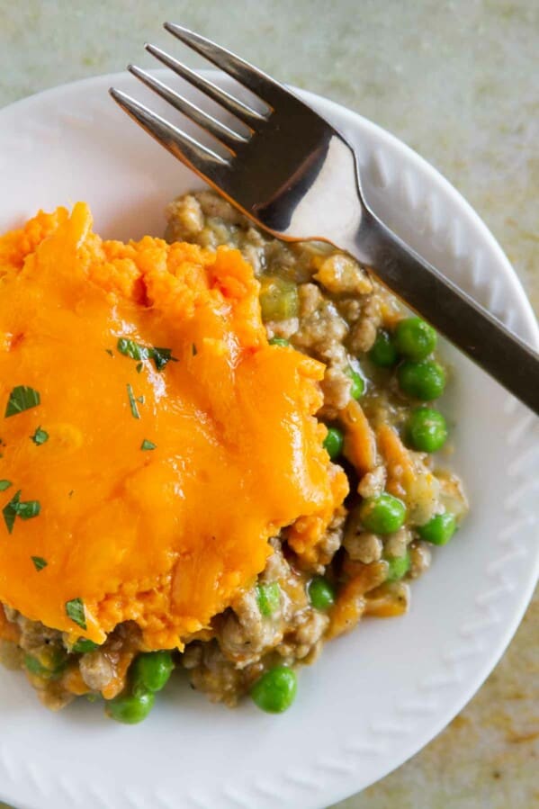 Plate with a serving of Turkey Shepherd's Pie with Sweet Potatoes.