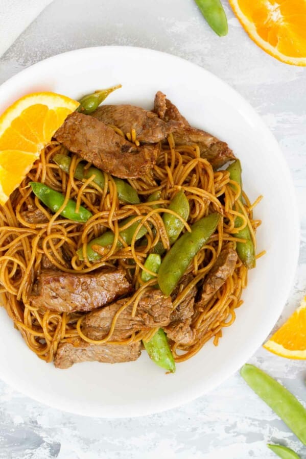Orange Teriyaki Beef with Noodles and peas.
