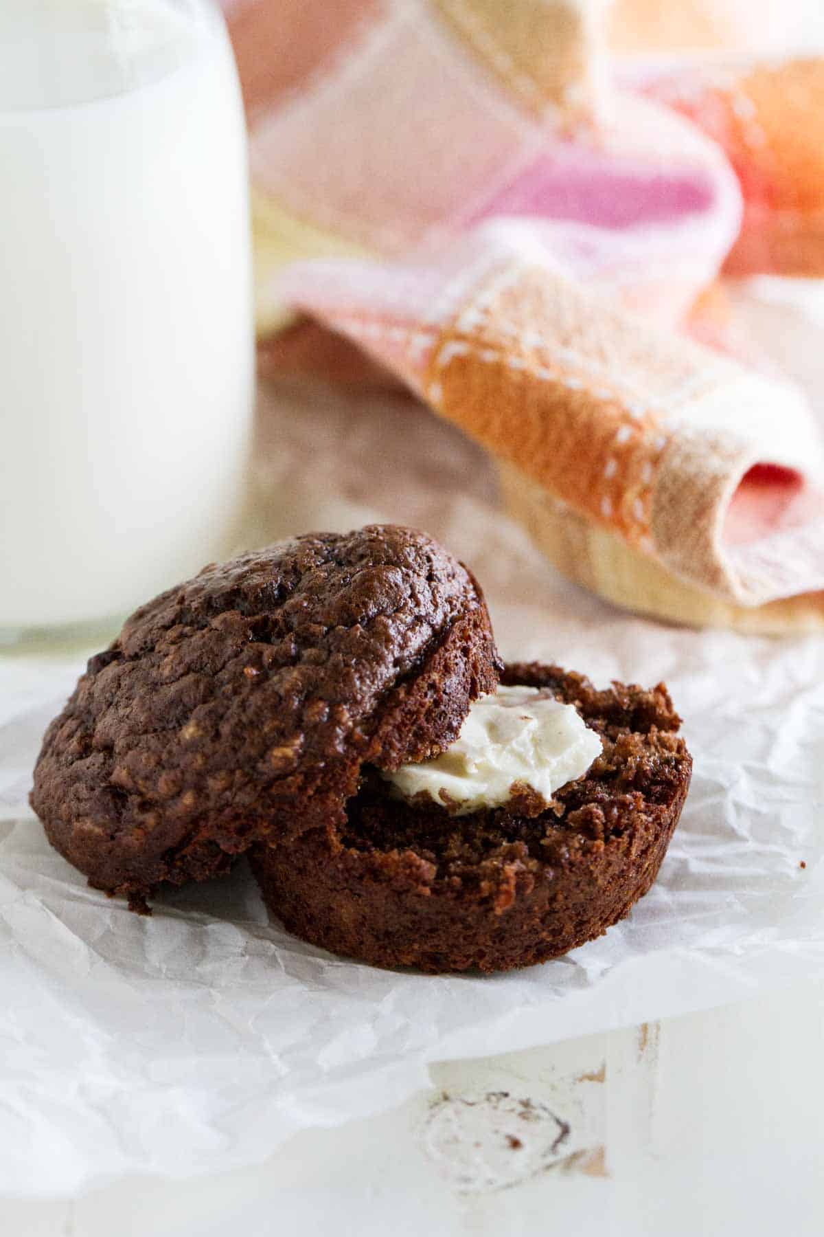 Oatmeal Muffin cut in half with butter.
