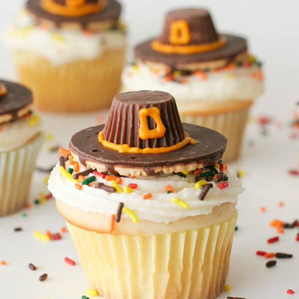 Cupcakes topped with edible Pilgrim Hats