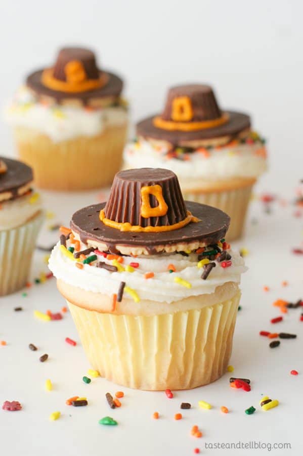 Cupcakes topped with edible Pilgrim Hats