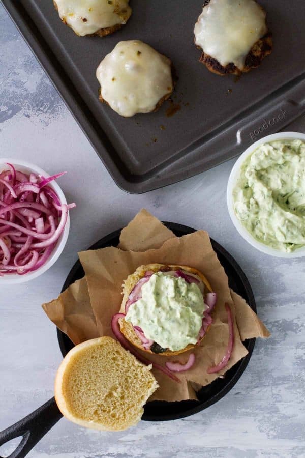 A fun alternative to regular burgers, these Poblano Pepper Slider Burgers are packed with pepper flavor. They are topped with marinated onions and a creamy guacamole to really take them over the top.