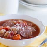 This White Bean Soup with Sausage is filled with vegetables, beans and smoked sausage, making an easy slow cooker soup that is so easy, filling, and comforting.