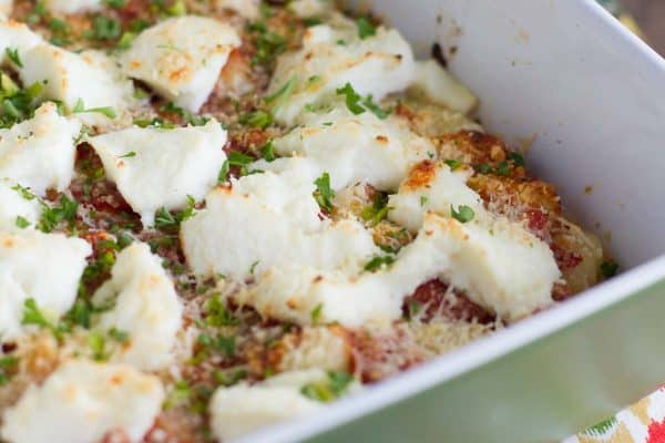 Dinner in a flash! This Baked Gnocchi with Ricotta takes prrepared gnocchi and tops it with marinara, ricotta and parmesan for this meatless weeknight dinner.