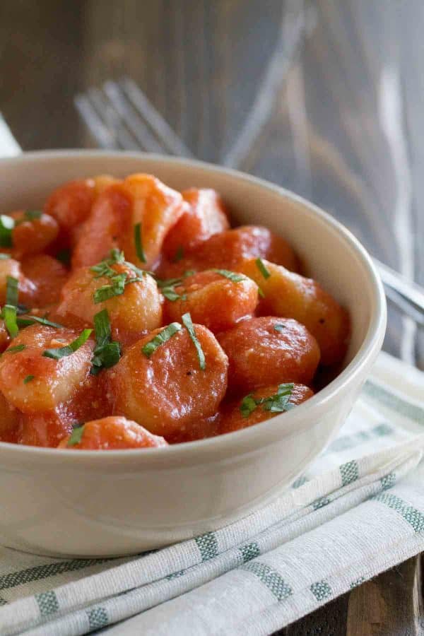 It doesn’t get much easier than this Ricotta Gnocchi with Tomato Sauce. Gnocchi is cooked and combined with a simple tomato sauce and ricotta.