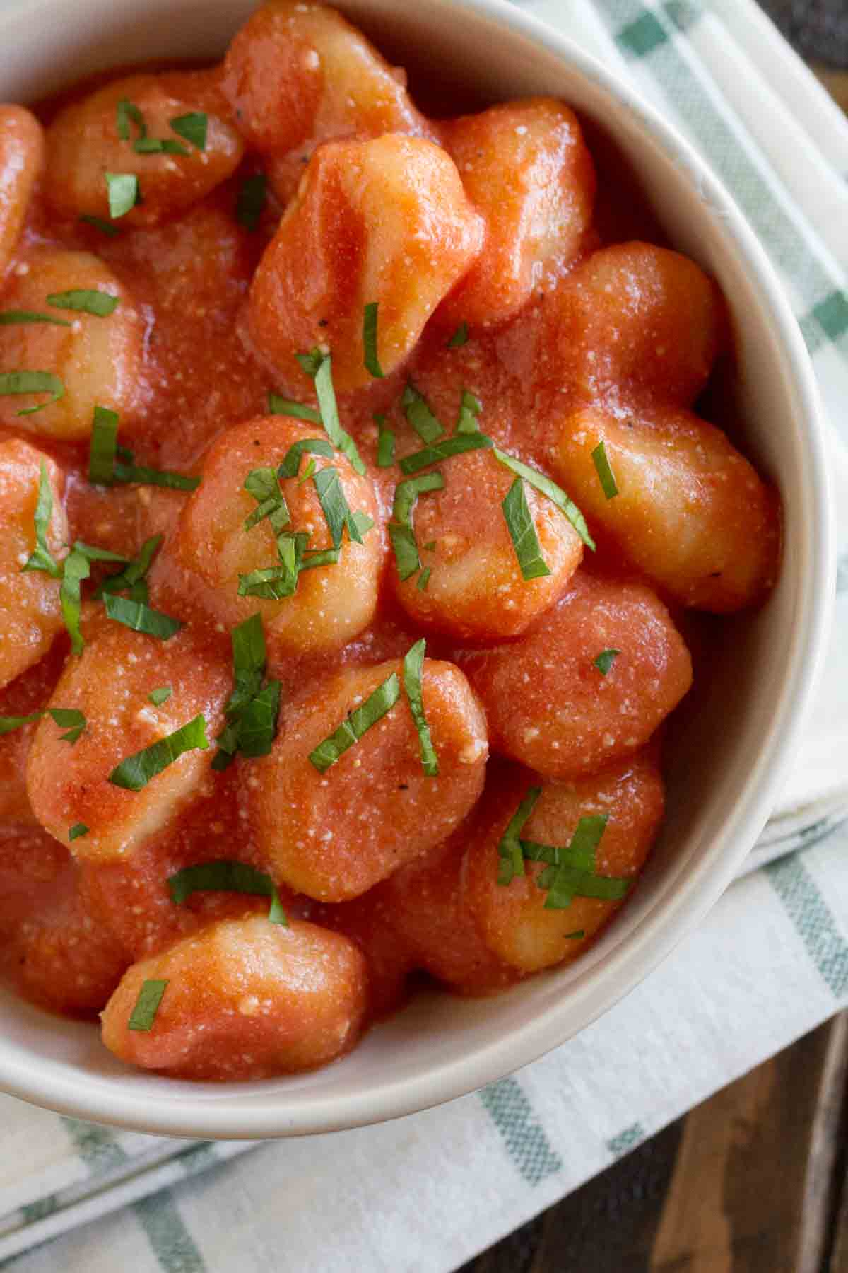 overhead view of gnocchi with ricotta and tomato sauce