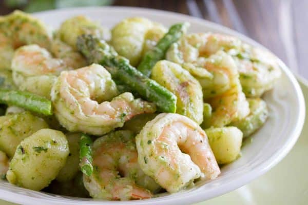 Easy enough for a weeknight meal, but impressive enough for company, this Gnocchi with Pesto, Shrimp and Asparagus is packed with flavor and done in less than 30 minutes!