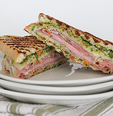 Muffuletta Style Grilled Ham and Cheese Sandwiches | www.tasteandtellblog.com