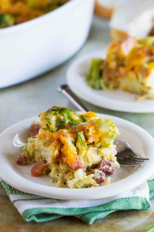 Serving of Ham and Cheese Strata with Broccoli on a small plate.