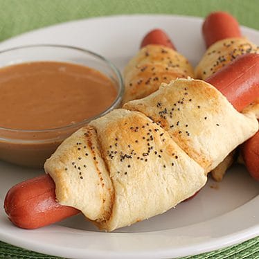 Cheesy Piggies in a Blanket with Come-Back Sauce | www.tasteandtellblog.com