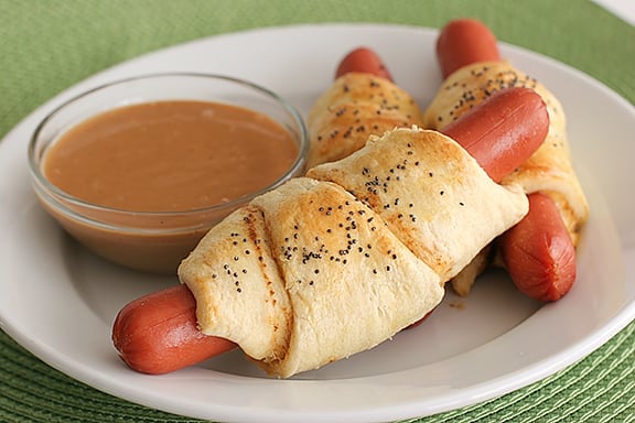 Cheesy Piggies in a Blanket with Come-Back Sauce | www.tasteandtellblog.com