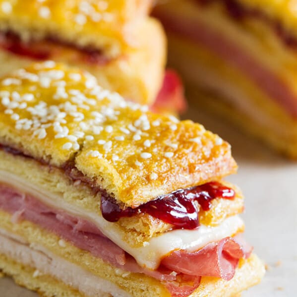 A favorite sandwich - the Monte Cristo - takes a different form in this sandwich loaf that has layers of crescent dough, turkey, ham, cheese, and raspberry jam. This Monte Cristo Sandwich Loaf is perfect for pot lucks or picnics.