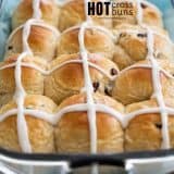 pan of hot cross buns with text