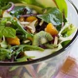 This sweet and savory summer salad is a family favorite - filled with lettuce, fruit, and a sweet and sour dressing. Steph’s Summer Salad is sure to become your favorite, too!