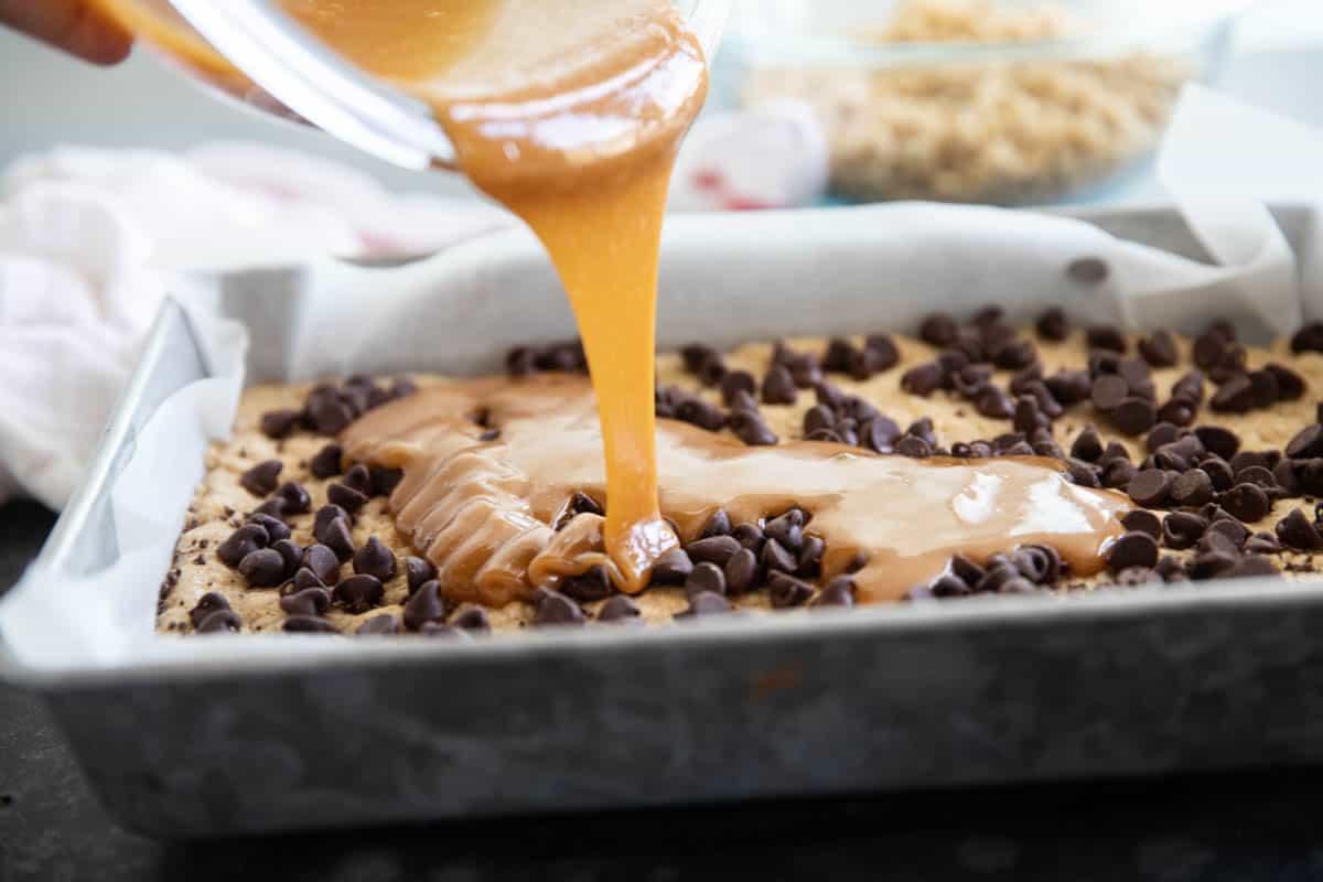 Pouring caramel for Carmelitas