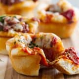 The kids will love these fun Pizza Cups - an easy twist for pizza night! They are also great for lunch on the go or for after school snacks!
